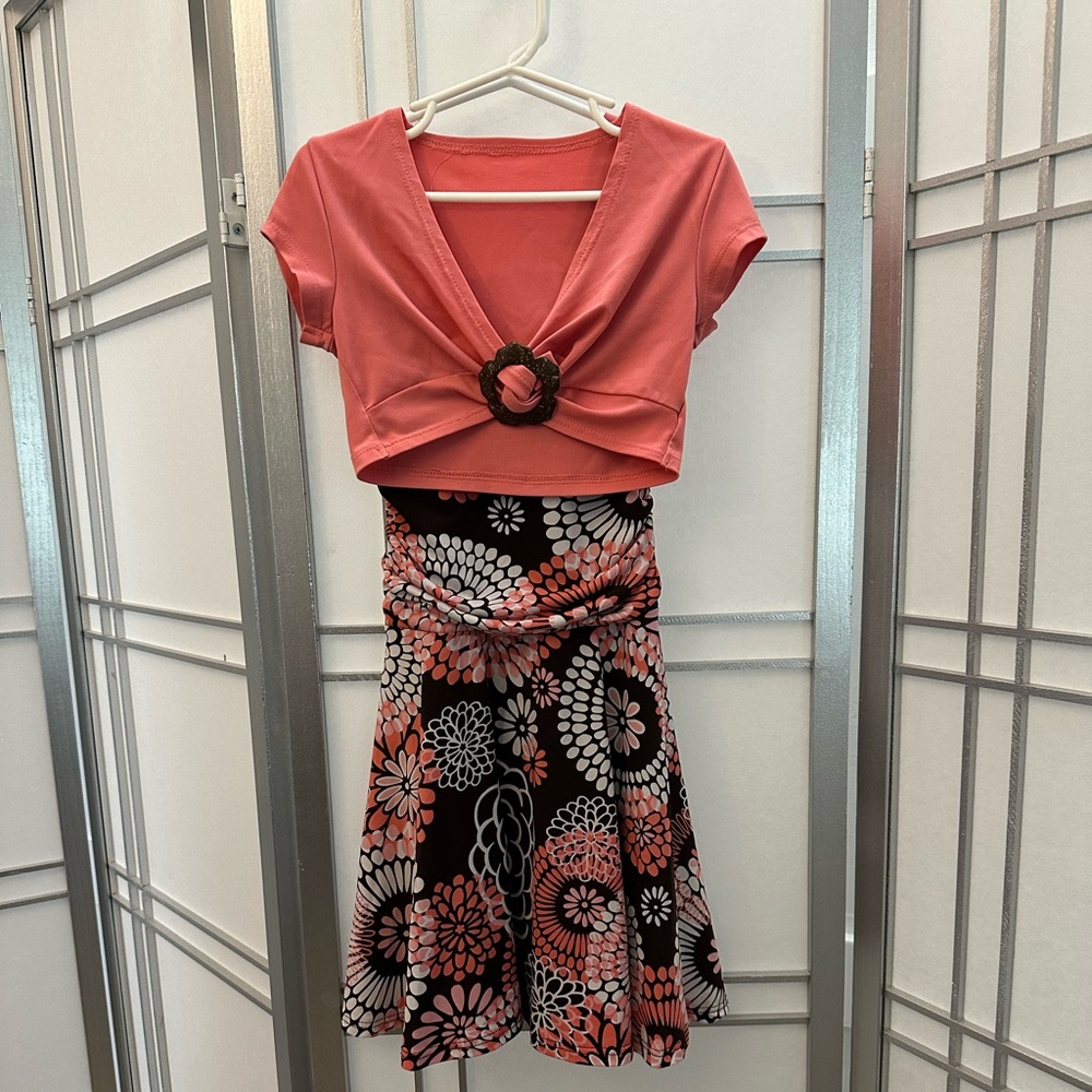 Great condition!  Girls size 7 dress. Two pieces.